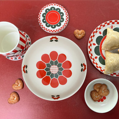 Top view of red-themed, Kolkata inspired ceramic bowl, side plate, ceramic mugs