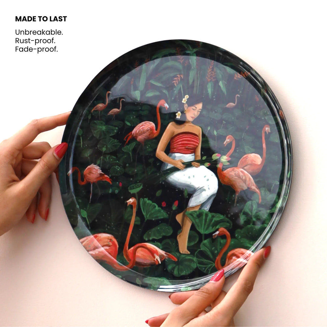 Decorative wall piece with a woman and flamingo. Perfect for living room wall decor