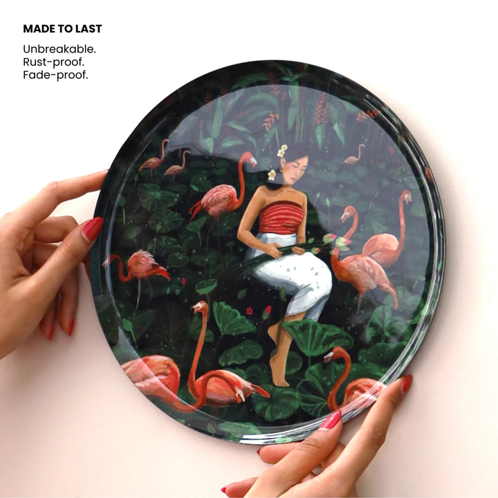 Decorative wall piece with a woman and flamingo. Perfect for living room wall decor