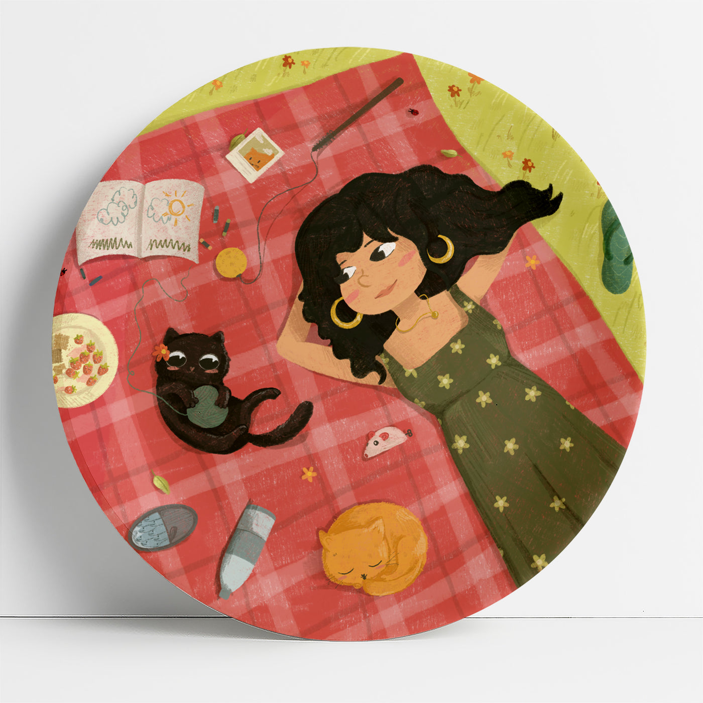 Woman with a cat on a picnic mat | home decor goods