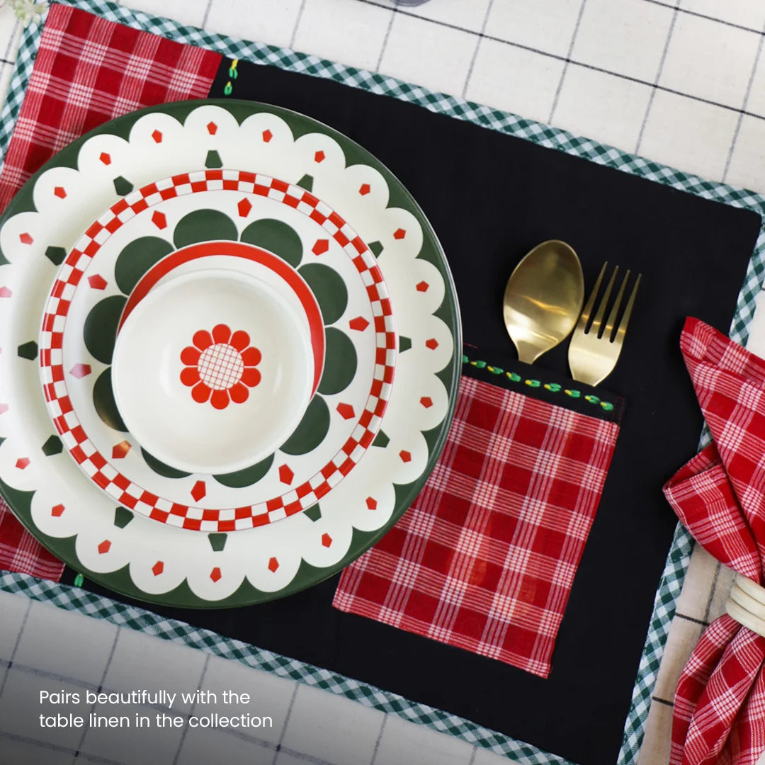 Pairing the ceramic bowls with the black and red table linen collection and gold cutlery | ceramic dinnerware set