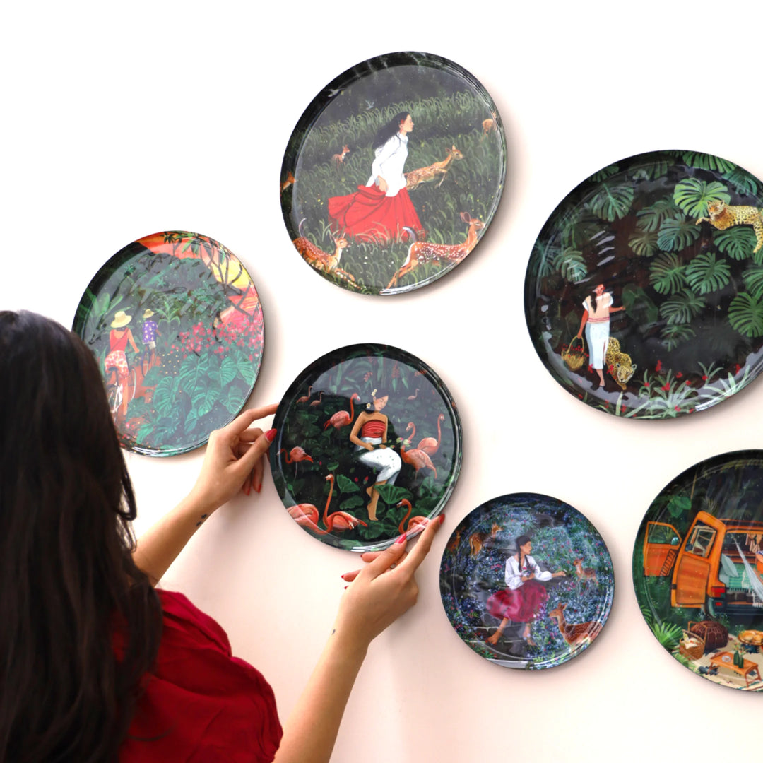 Arrange decorative plates in a pre-curated layout 